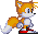 Tails the Fox facing to the right, occasionally looking at the user and then yawning.